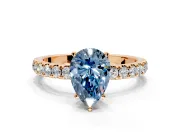 Open Basket Engagement Ring Setting for Fancy Blue Pear-Shaped Center with Pave Band and Prong Head in Rose Gold