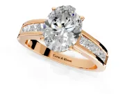 Solitaire Engagement Ring Setting for Oval Center with Princess Cut Channel Band and Prong Head in Rose Gold
