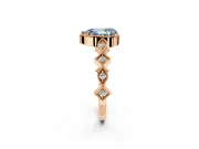 Milgrain Bezel Engagement Ring Setting for Fancy Blue Pear-Shaped Center with Marquise Stations and Bezel Head in Rose Gold