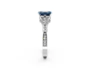 Solitaire Engagement Ring Setting for Fancy Blue Emerald Cut Center with Marquise and Bezel Accents and Prong Head in Platinum