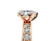 Solitaire Engagement Ring Setting for Pear-Shaped Center with Channel-Set Accents and Prong Head in Rose Gold