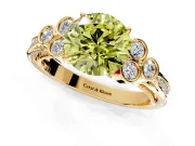 Cluster Engagement Ring Setting for Fancy Yellow Round Cut Center with Bezel Accent Clusters and Prong Head in Yellow Gold