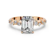 Cluster Engagement Ring Setting for Emerald Cut Center with Round Cut Accent Band and Prong Head in Rose Gold