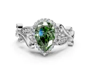 Halo Engagement Ring Setting for Fancy Green Pear-Shaped Center with Leaf Motif Split Shank and Prong Head in Platinum