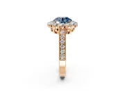 Halo Engagement Ring Setting for Fancy Blue Round Cut Center with Milgrain Channel Band and Prong Head in Rose Gold