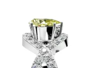 Halo Engagement Ring Setting for Fancy Yellow Pear-Shaped Center with Pave Infinity Twist Band and Prong Head in White Gold