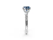 Solitaire Engagement Ring Setting for Fancy Blue Round Cut Center with Trailing Leaf Accent Band and Prong Head in Sterling Silver