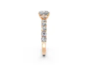 Shared-Prong Engagement Ring Setting for Cushion Cut Center with Graduated Accents and Prong Head in Rose Gold