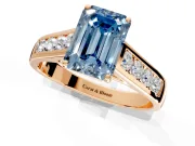 Solitaire Engagement Ring Setting for Fancy Blue Emerald Cut Center with Round Cut Channel Band and Prong Head in Rose Gold