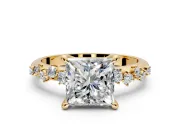 Solitaire Engagement Ring Setting for Princess Cut Center with Trailing Leaf Accent Band and Prong Head in Yellow Gold