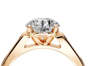 Solitaire Engagement Ring Setting for Round Cut Center with Channel Accents and Prong Head in Rose Gold