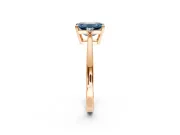 3 Stone Engagement Ring Setting for Fancy Blue Emerald Cut Center with Low-Set Round Cut Accents and Prong Head in Rose Gold