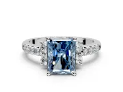 Paired Accent Engagement Ring Setting for Fancy Blue Radiant Cut Center with Pave Band and Prong Head in Platinum