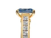 Solitaire Engagement Ring Setting for Fancy Blue Emerald Cut Center with Channel Band and Double Claw Prong Head in Yellow Gold