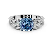 Cluster Engagement Ring Setting for Fancy Blue Cushion Cut Center with Bezel Accent Clusters and Prong Head in White Gold