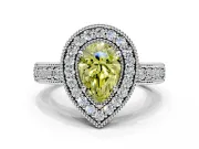 Milgrain Halo Engagement Ring Setting for Fancy Yellow Pear-Shaped Center with Pave Band and Prong Head in Platinum