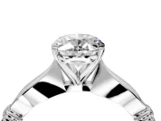 Solitaire Engagement Ring Setting for Oval Center with Carved Leaf Shoulders and Prong Head in Platinum
