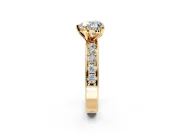 Solitaire Engagement Ring Setting for Heart-Shaped Center with Channel-Set Accents and Prong Head in Yellow Gold