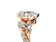 Solitaire Engagement Ring Setting for Pear-Shaped Center with Marquise Accent Twist Band and Prong Head in Rose Gold