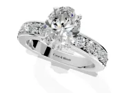 Solitaire Engagement Ring Setting for Oval Center with Channel-Set Accents and Prong Head in Sterling Silver
