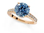 Solitaire Engagement Ring Setting for Fancy Blue Round Cut Center with Crossover Accents and Prong Head in Rose Gold