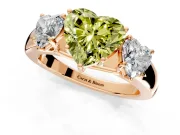 3 Stone Engagement Ring Setting for Fancy Yellow Heart-Shaped Center with Raised Basket Heads and Prong Head in Rose Gold