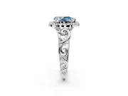 Halo Engagement Ring Setting for Fancy Blue Pear-Shaped Center with Open Scroll Shoulders and Prong Head in White Gold