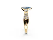 3 Stone Engagement Ring Setting for Fancy Blue Pear-Shaped Center with Pave Split Shank and Prong Head in Yellow Gold