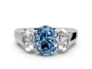 3 Stone Engagement Ring Setting for Fancy Blue Oval Center with Raised Basket Heads and Prong Head in Platinum
