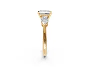 3 Stone Engagement Ring Setting for Princess Cut Center with Large Pear-Shaped Accents and Prong Head in Yellow Gold