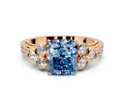 Cluster Engagement Ring Setting for Fancy Blue Radiant Cut Center with Bezel Accent Clusters and Prong Head in Rose Gold