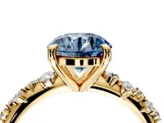 Solitaire Engagement Ring Setting for Fancy Blue Round Cut Center with Trailing Leaf Accent Band and Prong Head in Yellow Gold