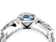 Channel-Set Engagement Ring Setting for Fancy Blue Pear-Shaped Center with Baguette Band and Prong Head in Sterling Silver
