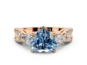 3 Stone Engagement Ring Setting for Fancy Blue Heart-Shaped Center with Pave Split Shank and Prong Head in Rose Gold