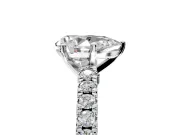 Solitaire Engagement Ring Setting for Pear-Shaped Center with Single Row Accent Band and Prong Head in Platinum