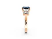 Floral Engagement Ring Setting for Fancy Blue Emerald Cut Center with Marquise Cluster Shoulders and Prong Head in Rose Gold