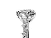 Solitaire Engagement Ring Setting for Heart-Shaped Center with Trailing Leaf Accent Band and Prong Head in White Gold