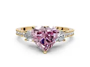 3 Stone Engagement Ring Setting for Fancy Pink Heart-Shaped Center with Round Cut Side Accents and Prong Head in Yellow Gold