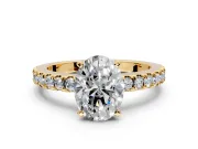 Solitaire Engagement Ring Setting for Oval Center with Single Row Accent Band and Prong Head in Yellow Gold