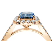 Halo Engagement Ring Setting for Fancy Blue Emerald Cut Center with Narrowing Pave Band and Prong Head in Rose Gold