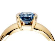 Tension Engagement Ring Setting for Fancy Blue Emerald Cut Center with Wide Flat Band and Tension Head in Yellow Gold