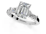 3 Stone Engagement Ring Setting for Emerald Cut Center with Channel Baguette Accents and Prong Head in Platinum