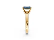 Solitaire Engagement Ring Setting for Fancy Blue Emerald Cut Center with Wire Band and Prong Head in Yellow Gold