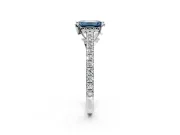 Solitaire Engagement Ring Setting for Fancy Blue Emerald Cut Center with Widening Pave Band and Claw Prong Head in Sterling Silver