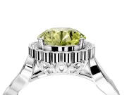 Halo Engagement Ring Setting for Fancy Yellow Round Cut Center with Leaf Motif Split Shank and Prong Head in Platinum