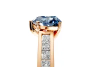 Solitaire Engagement Ring Setting for Fancy Blue Heart-Shaped Center with Princess Cut Channel Band and Prong Head in Rose Gold