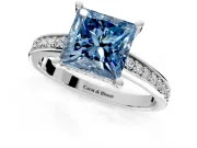 Solitaire Engagement Ring Setting for Fancy Blue Princess Cut Center with Channel-Set Accent Band and Prong Head in Platinum