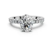 Solitaire Engagement Ring Setting for Oval Center with Single Row Accent Band and Prong Head in Platinum